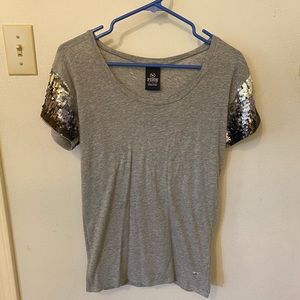 Pink XS grey shirt with hot pink writing and sequins on sleeves.